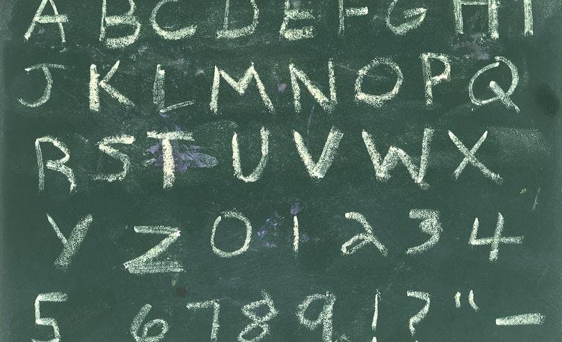Letters and numbers are shown in a green board
