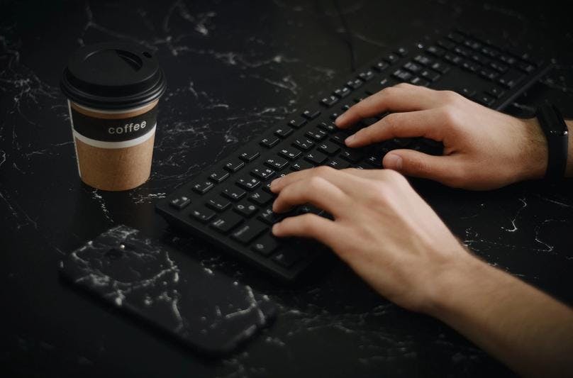 Typing on a keyboard with both hand