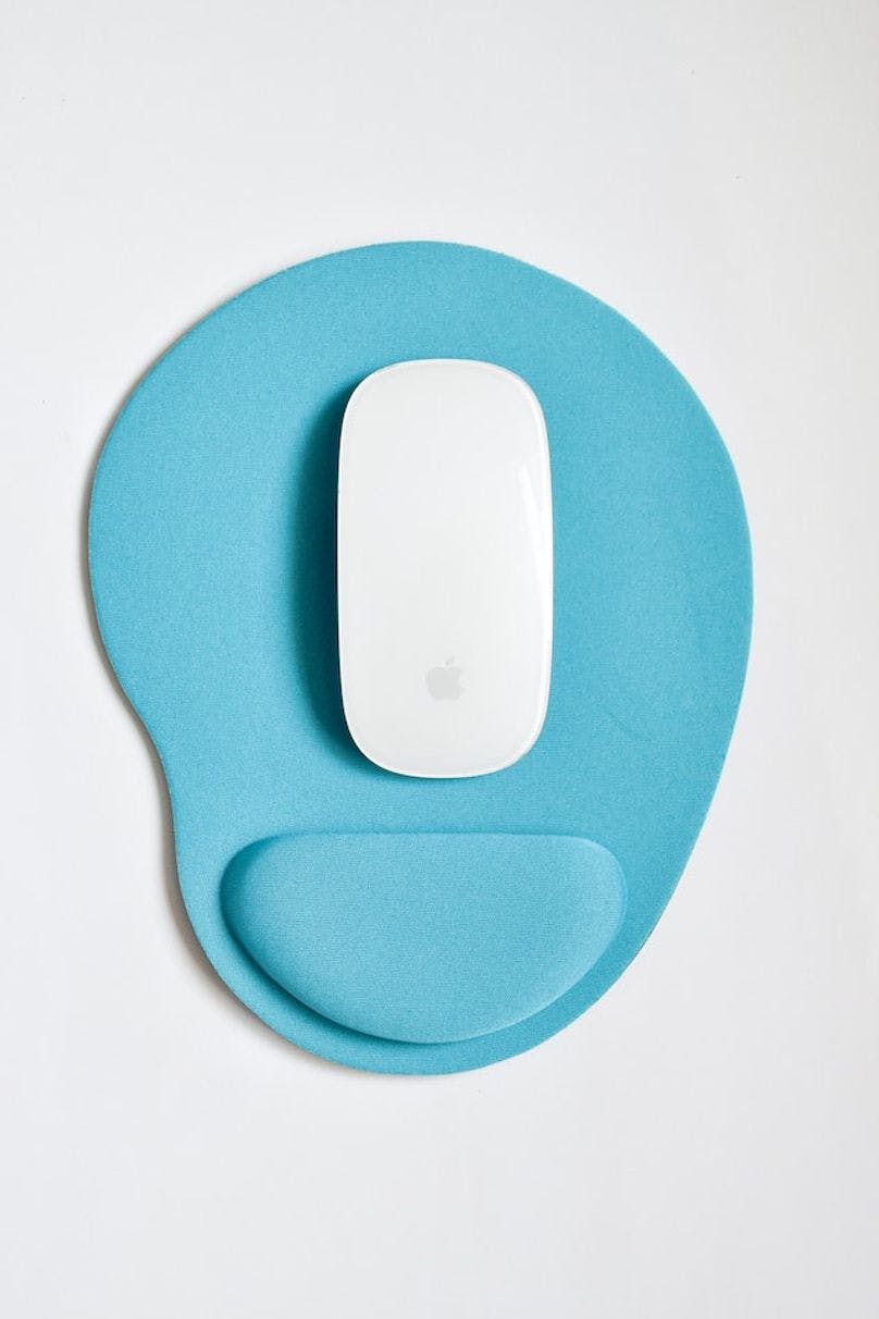 A mousepad with a mouse